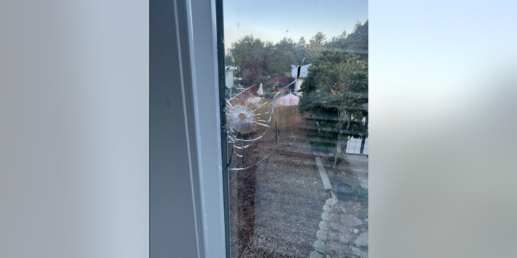 Hole in the window of former San Jose State assistant volleyball coach Melissa Batie-Smoose after an incident where her home was shot at by, what police have determined, was a pellet gun. 